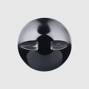 Close-up of a high-quality black butterfly shell button with elegant luster