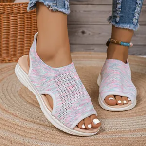 Detailed close-up view of women's colorful knit mesh peep-toe platform sports sandals