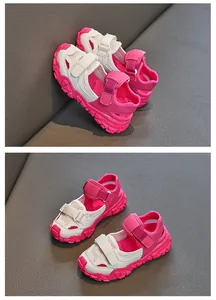 Close-up detail of pink and white mesh breathable sports sandals for kids summer.
