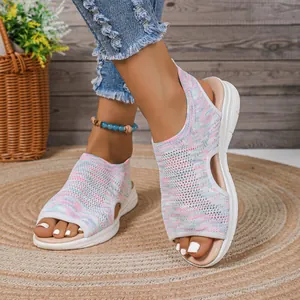 Detail view of colorful mesh peep-toe sandals with white platform sole for summer comfort