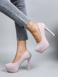 Detailed view of sexy pink glitter platform high heels featuring a 16cm sleek stiletto heel