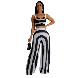 Elegante conjunto de dos piezas para mujer con top corto y pantalones anchos a rayas negras