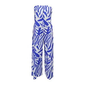 Detail of blue and white abstract floral print on stylish strapless wide-leg jumpsuit