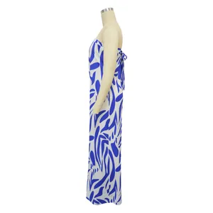 Detailed side view of a stylish blue and white abstract print strapless wide-leg jumpsuit