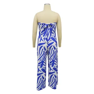 Blue and white printed tube top wide-leg jumpsuit showing the back tie detail