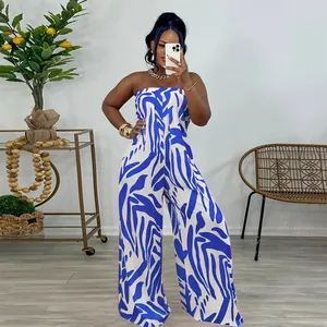 Sleeveless strapless wide-leg jumpsuit with blue zebra print worn by a fashion model