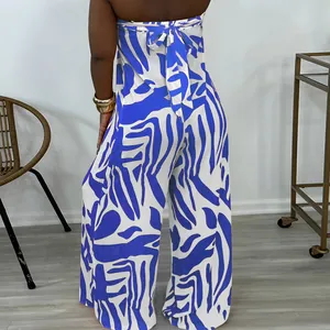 Back view of a fashion blue and white print sleeveless wide-leg jumpsuit for women