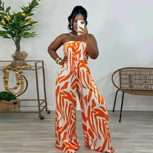 Fashionable orange zebra print strapless wide-leg jumpsuit for a chic summer look