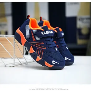 Navy blue and orange boys' mesh running shoes with breathable velcro strap design