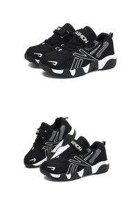 Detailed side view of black mesh boys' running sneakers with breathable white accents.