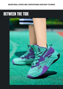 Detailed close-up view of mint green boy's basketball shoes with purple accents on court