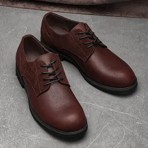 Detailed view of men's leather oxford shoes featuring suede and grain cowhide texture