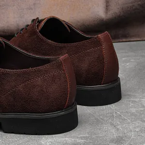 Close-up showing the premium suede texture and leather heel of men's casual dress shoes
