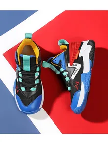 Top-down view of boys basketball shoes showing the vibrant multi-color design and textures