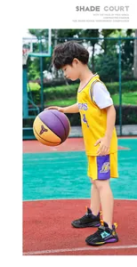 Detailed view of stylish breathable mesh basketball shoes for boys on a sports court.
