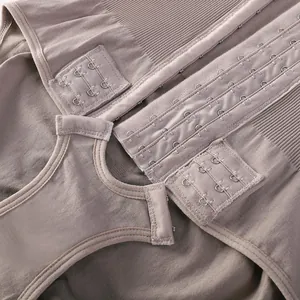 Close-up of hook-and-eye closures and ribbed fabric texture on tummy control shapewear