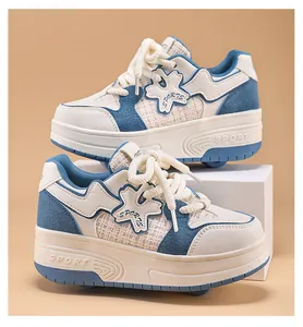 Detail of blue and white girls' retractable double-wheel roller shoes with platform sole