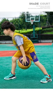 Boys' breathable mesh basketball shoes worn by child athlete on court