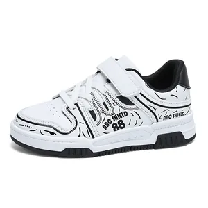 Zapatillas blancas infantiles con patrones de garabatos negros, transpirables, 6-12 años.