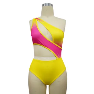 Detailed view of the pink and yellow one-shoulder bodysuit with sexy cut-out design.