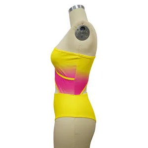 Side view of vibrant yellow and pink gradient one-piece swimsuit on mannequin