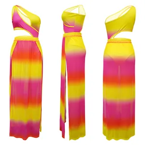 Detailed view of sexy one-shoulder bodysuit and high-slit long skirt in vibrant gradient print