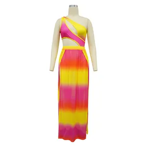 Vibrant pink and yellow ombre two-piece set featuring asymmetrical bodysuit and high-slit skirt