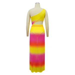 Back view of vibrant ombré gradient one-shoulder bodysuit and sheer maxi skirt set