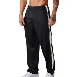 Detail showing the white stripes and straight fit of these black men's casual pants