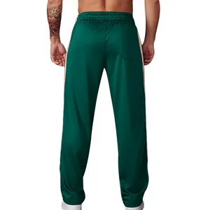 Back view of men's green straight-leg track pants with side stripes and back pocket