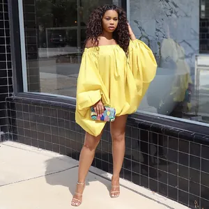 Stylish yellow off-shoulder mini dress featuring puff batwing sleeves and a loose fit silhouette