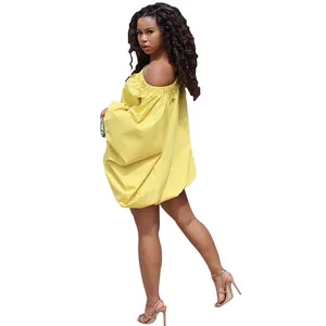 Side view of yellow off-the-shoulder loose batwing sleeve mini dress