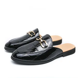Elegant men's black crocodile embossed leather mule loafers with gold metal buckle