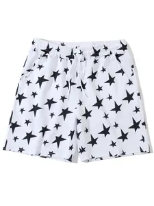 Detailed view of men's white casual beach shorts with black star pattern print