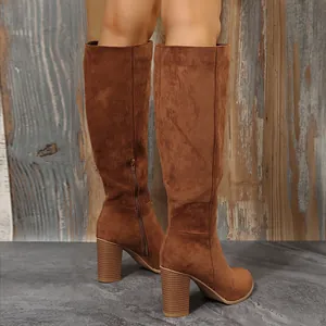 Stylish brown suede knee-high boots with chunky heels and side zippers for autumn winter