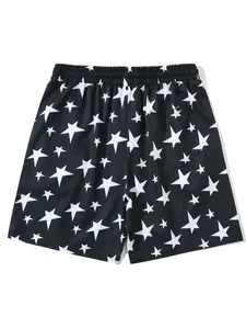 Back view of men's woven black beach shorts with white star print and back pocket