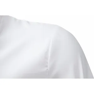 Detailed macro close-up of the shoulder seam on a white long-sleeved men's business shirt