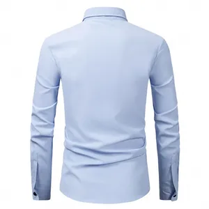 Detail back view of a slim-fit men's light blue long-sleeve business dress shirt.
