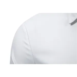 Close-up view of the fine shoulder stitching and collar on a light grey men's dress shirt.