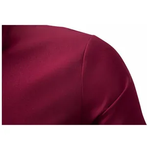 Close-up showing the shoulder seam and wine red fabric texture of a formal men's shirt