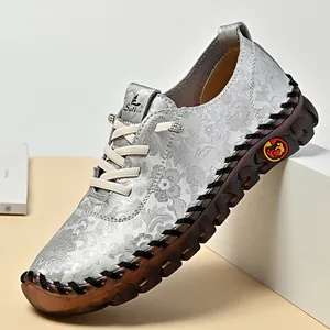 Silver floral hand-stitched casual flats for women with soft sole and lace-up design