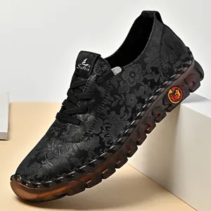 Elegant hand-stitched floral casual flat shoes for women featuring a soft brown rubber sole