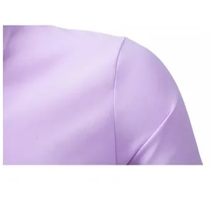 Detailed macro view of a light purple men's business shirt shoulder seam.
