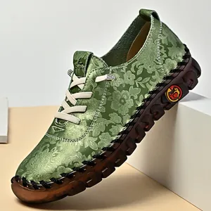 Hand-stitched green floral leather casual flats with soft soles for stylish women