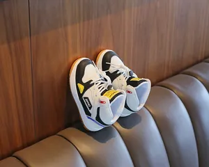 Stylish children's high-top patchwork sneakers featuring comfortable soft soles and sport details