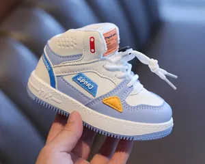 Comfortable blue and white high-top toddler sneaker with 'SPORT' logo and soft rubber sole