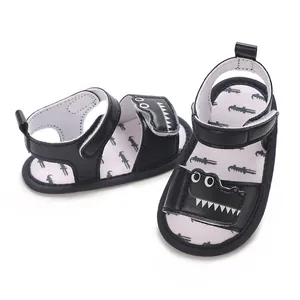 Cute baby infant sandals featuring black cartoon crocodile design with soft anti-slip soles