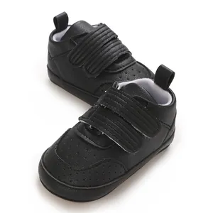 Stilvolle schwarze Baby-Lernlaufschuhe mit weicher Sohle und doppeltem Klettverschluss