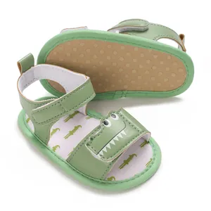 Soft-sole green baby sandals with cute crocodile cartoon design and non-slip rubber dots