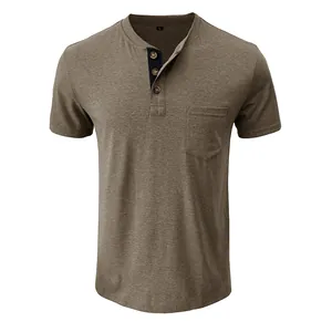Detailed view of brown Henley t-shirt with three-button placket and chest pocket